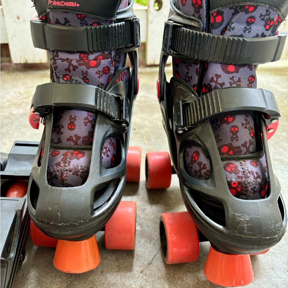 Kids size 12 - 2 adjustable roller skates with interchangeable roller blades.